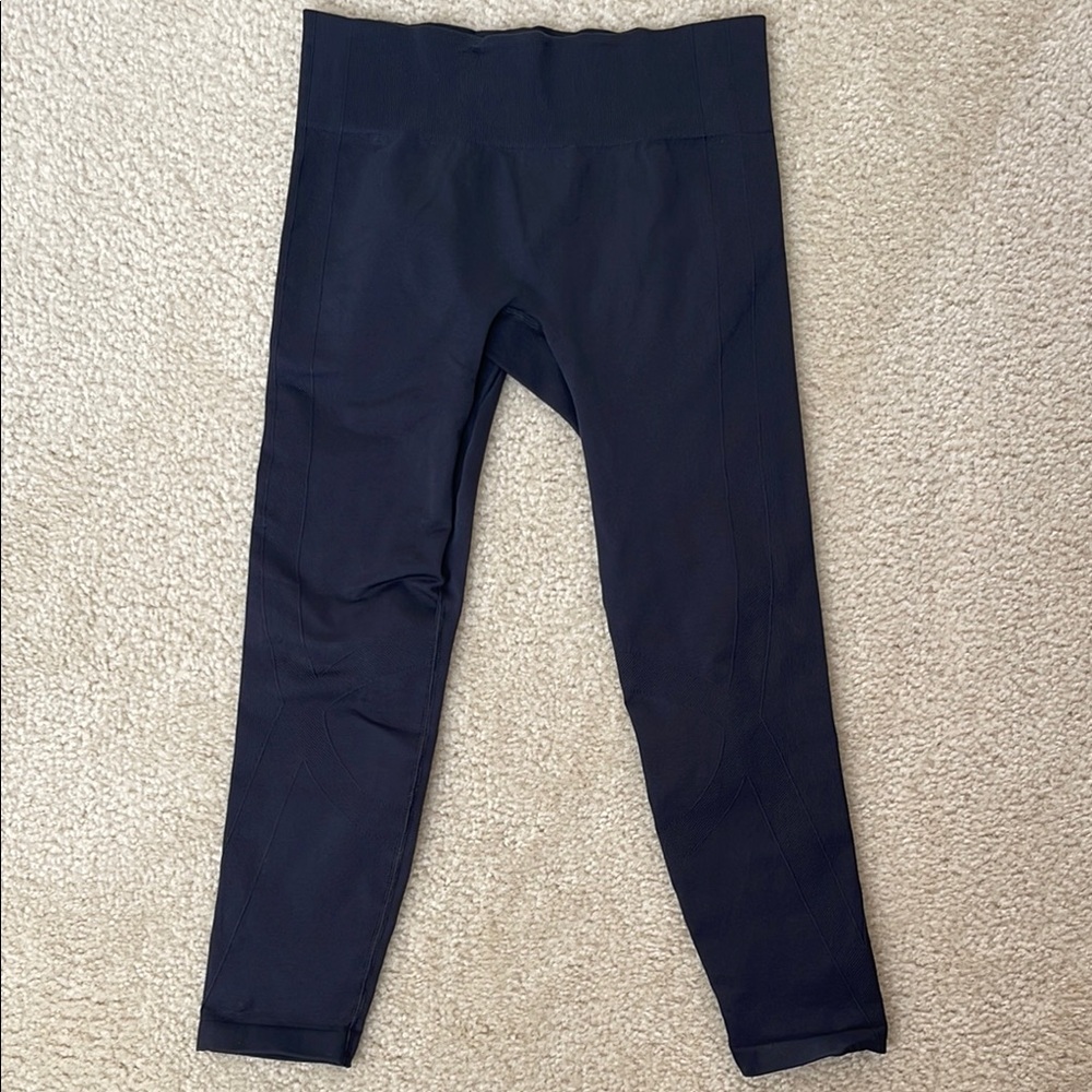 Under Armour Black Leggings with Elastic Waistband and Tapered Fit